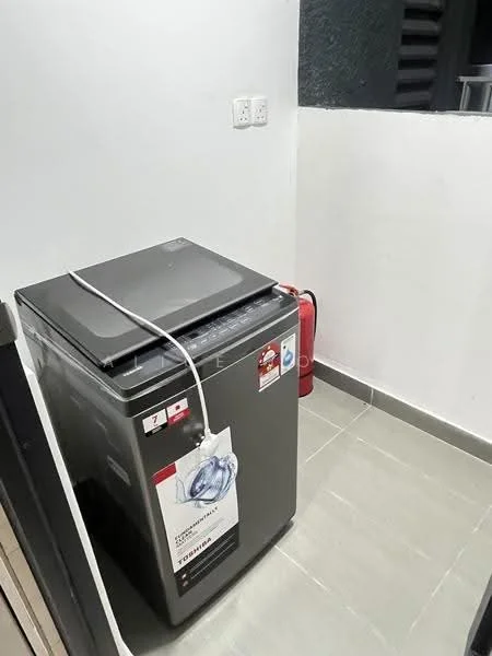 Laundry features: top-load washing machine in grey, grey tiled flooring, white painted walls, fire extinguisher, power outlet, water supply connection.