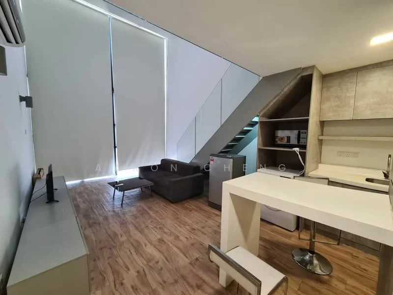 Living features: grey fabric sofa, flat-screen TV on wall-mounted console, wooden flooring, large windows with sheer blinds, recessed lighting, open-plan layout, staircase leading to upper level, white kitchen island with seating, stainless-steel fridge, built-in cabinetry, countertop with storage; style: modern.