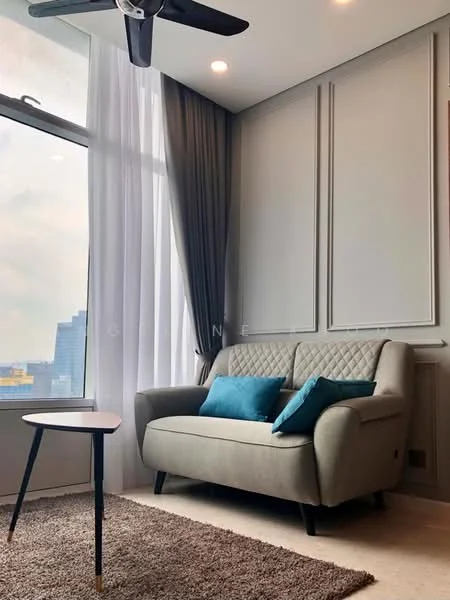 Living features: 3-seater fabric sofa in grey, turquoise throw pillows, small round side table with black legs, light brown area rug, floor-to-ceiling windows, sheer white curtains, dark grey curtains, decorative wall paneling, ceiling fan with light; style: modern; view: city.