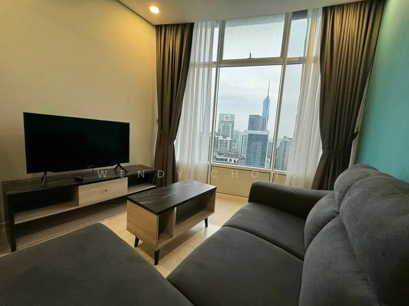 Living features: grey fabric sofa, coffee table, TV console, wall-mounted TV, floor-to-ceiling windows, city skyline view, curtains, neutral wall colour, light-coloured flooring, decorative wall; style: modern; view: city.