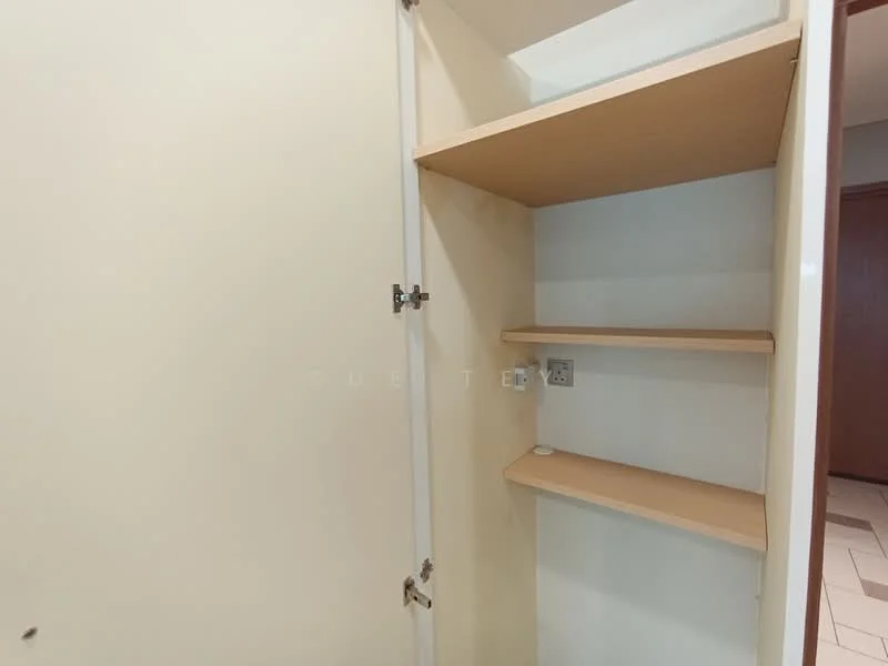 Room features: built-in cabinet, shelves, white painted walls, light-colored wood shelving, electrical outlet.