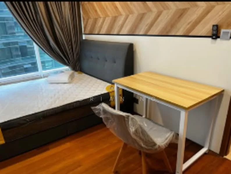 Bedroom features: queen-size bed with grey upholstered headboard, wooden flooring, brown accent wall with wood paneling, floor-to-ceiling window with sheer curtains, study desk with wooden top, plastic-covered chair, rolled towel on bed; style: modern; view: city.
