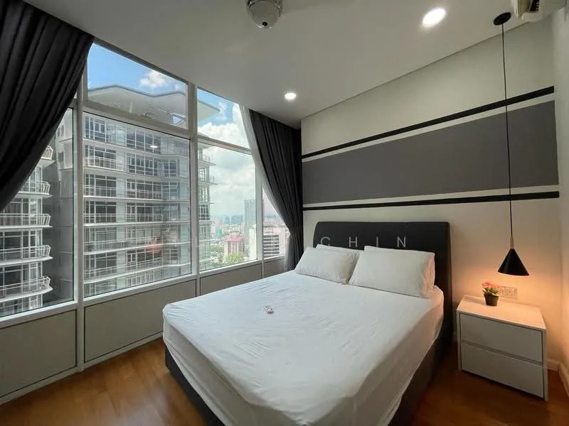 Bedroom features: king-size bed with upholstered headboard, white bedding, floor-to-ceiling windows, grey accent wall, black bedside table, pendant light, wooden flooring, curtains in dark grey, city view; style: modern; view: city.
