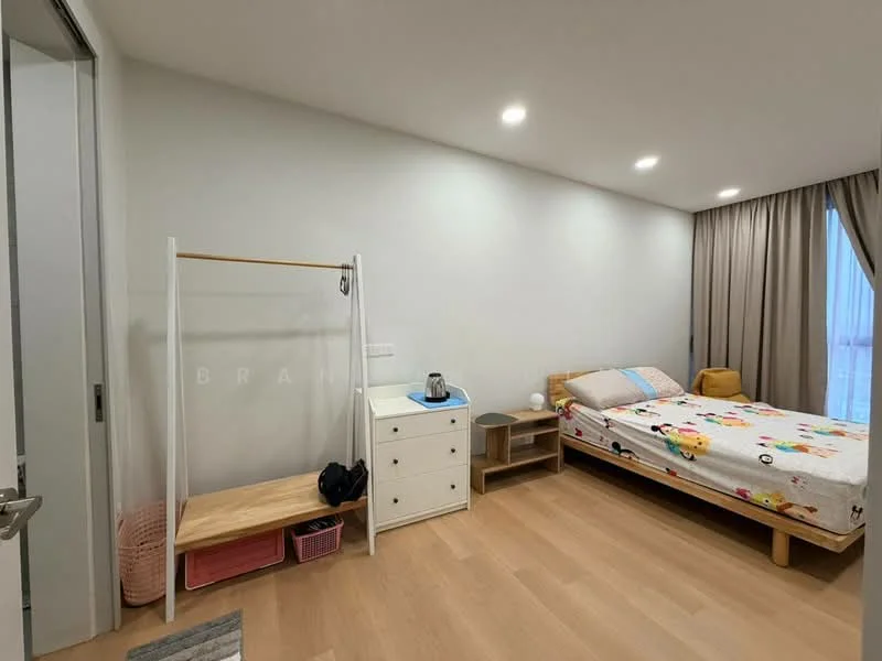 Bedroom features: queen-size bed with colorful bedding, wooden bed frame, nightstand with drawer, white dresser with multiple drawers, open clothing rack, curtains, recessed ceiling lights, laminate flooring, wall-mounted electrical outlets, window with natural light; style: modern.