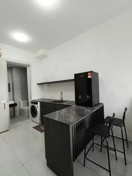 Kitchen features: black cabinetry, marble countertop, single-bowl stainless-steel sink, chrome pull-down faucet, built-in washing machine, black fridge, stool seating, white tiled flooring, white painted walls, recessed ceiling lights; style: modern. Room features: toilet visible, grey tiled wall.