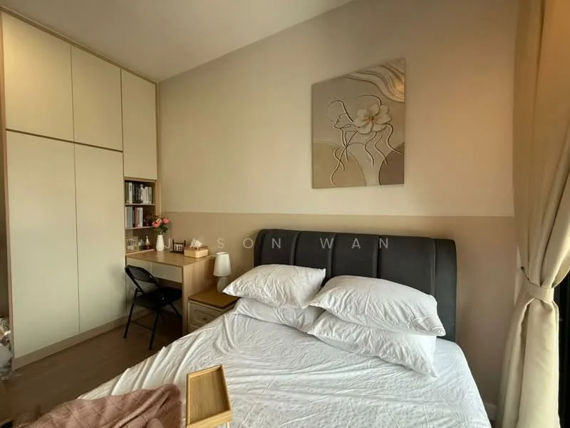 Bedroom features: king-size bed with grey upholstered headboard, white bedding, wooden bedside table, black chair, built-in wardrobe with sliding doors, decorative wall art, light brown wall, curtains, wooden flooring, desk with lamp; style: modern.