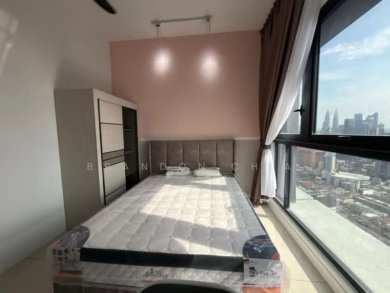 Bedroom features: king-size bed, upholstered headboard, floor-to-ceiling windows, city skyline view, light-colored walls, cream curtains, laminate flooring, built-in wardrobe; style: modern; view: city.