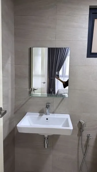 Bathroom features: wall-mounted sink, chrome basin mixer faucet, framed mirror, tile cladding on walls, light-colored wall tiles, handheld shower, toilet bidet spray, neutral flooring; style: modern.