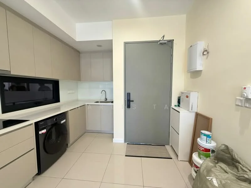 Kitchen features: light grey cabinetry, white countertop, single-bowl stainless-steel sink, chrome pull-down faucet, built-in microwave, black front-loading washing machine, tile flooring, recessed downlights, floor-to-ceiling cabinet, door to exterior, white wall-mounted unit, paint cans on the floor; style: modern.