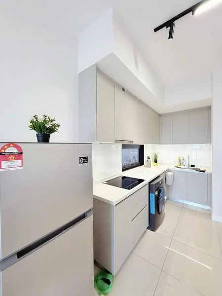 Kitchen features: light grey cabinetry, white countertop, built-in oven, stainless-steel fridge, black cooktop, single-bowl stainless-steel sink, chrome pull-down faucet, white tiled backsplash, washing machine, recessed downlights, sliding cabinet doors, plant on countertop, grey tile flooring; style: modern.