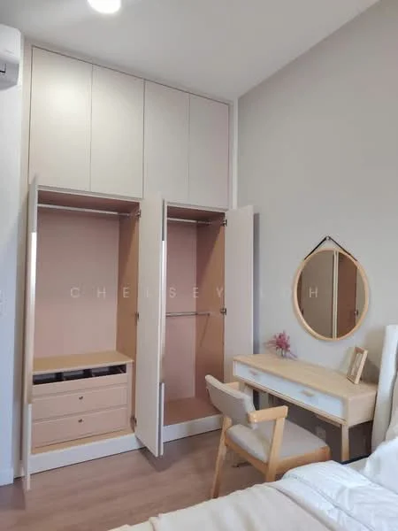 Bedroom features: built-in wardrobe with sliding doors, light wood cabinetry, two open sections for hanging clothes, one section with drawers, round wall mirror, study desk in light wood, upholstered chair, laminate flooring, neutral wall color, ceiling light fixture; style: modern.