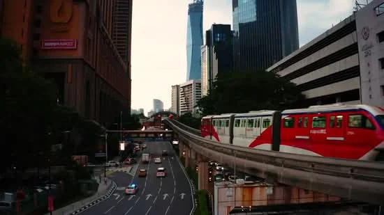 Exterior features: city skyline, monorail train, urban road, high-rise buildings, traffic, street lights, green landscaping; style: modern.