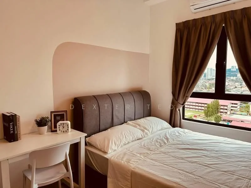Bedroom features: king-size bed with upholstered headboard, white bedding, study desk with white chair, floor-to-ceiling window, curtains in brown, decorative plant on desk, wall-mounted air conditioning unit, city skyline view; style: modern; view: city.