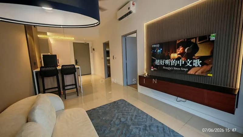 Living features: cream sofa, area rug with geometric pattern, wall-mounted TV, TV console, recessed lighting, wall panel with LED backlighting, 1 wall-mounted split AC, decorative wall art, open shelving, neutral painted walls, glossy tile flooring; style: modern. Kitchen features: bar stools, kitchen island, countertop, cabinets, refrigerator, microwave, stainless-steel sink, chrome faucet; style: modern.