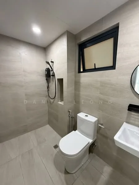 Bathroom features: light grey tile flooring, light grey tile walls, walk-in shower with glass partition, rain shower head, handheld shower, chrome basin mixer faucet, white sink, round mirror, one-piece toilet, window for natural light, built-in niche for toiletries, recessed ceiling lights; style: modern.