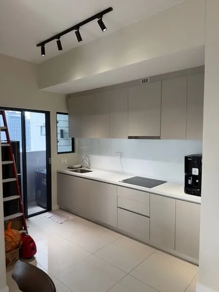 Kitchen features: light grey cabinetry, white countertop, single-bowl stainless-steel sink, chrome pull-down faucet, built-in induction cooktop, built-in oven, black coffee machine, white backsplash, recessed downlights, sliding glass door, floor-to-ceiling windows, ceramic tile flooring, ladder, appliance garage; style: modern.