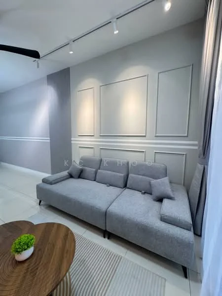 Living features: grey fabric sectional sofa, decorative cushions, wooden coffee table, area rug, white painted walls, grey accent wall, recessed lighting, wall paneling, curtains, floor tiles; style: modern.