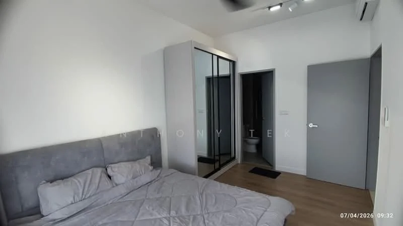 Bedroom features: queen-size bed with grey upholstered headboard, light grey bedding, wooden flooring, built-in wardrobe with mirrored sliding doors, wall-mounted air conditioning unit, recessed ceiling lights, white painted walls, door leading to bathroom, black doormat; style: modern.