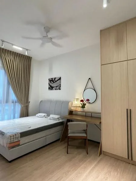 Bedroom features: queen-size bed with grey upholstered headboard, wooden bedside table, study desk with chair, mirror with decorative frame, floor-to-ceiling windows with sheer curtains, ceiling fan, light-colored wooden flooring, built-in wardrobe with sliding doors, decorative wall art; style: modern.