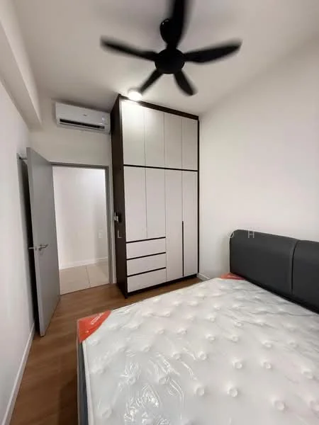 Bedroom features: queen-size bed, upholstered headboard, built-in wardrobe with white and wood finish, 5-blade ceiling fan with light, wall-mounted split AC, wooden flooring, neutral painted walls, door leading to hallway; style: modern.