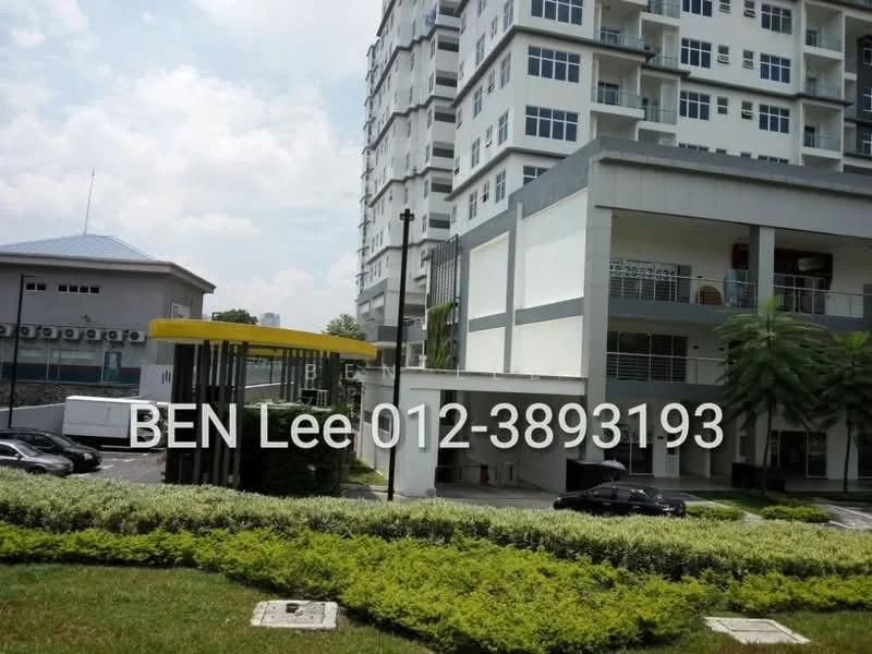 Exterior type: high-rise condominium; features: white painted facade, glass curtain wall, manicured lawn, paved walkway, parking area with cars, security gate, surrounded by greenery; style: modern.