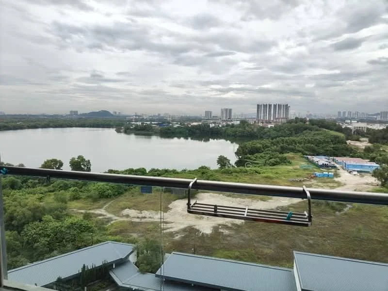 Exterior type: high-rise condominium; features: lake view, surrounding greenery, city skyline in background, balcony with railing, cloudy sky, landscaped area, nearby construction site; style: modern.
