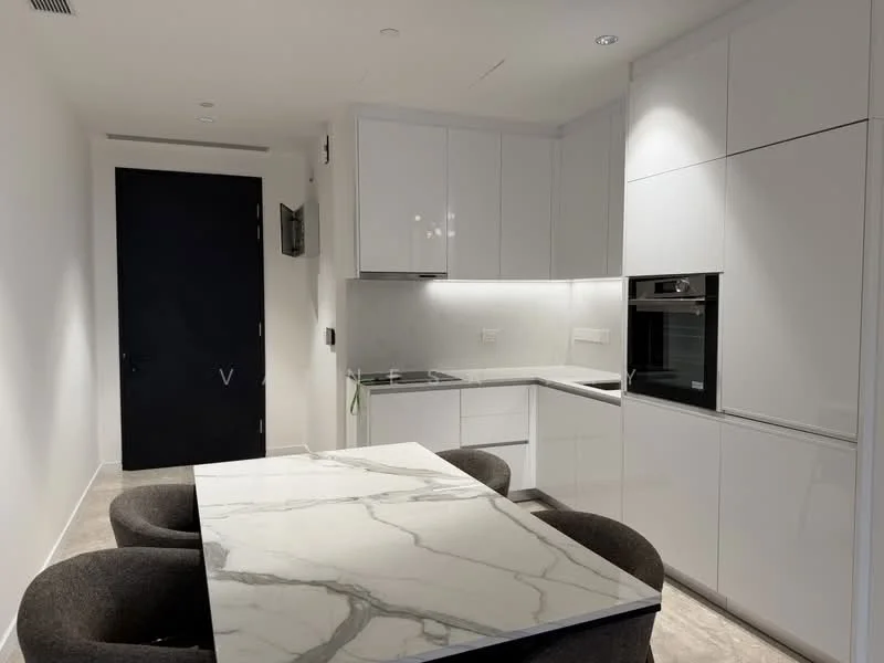 Kitchen features: white cabinetry, marble dining table, 4 upholstered chairs, built-in oven, stainless-steel sink, chrome faucet, grey stone countertop, recessed downlights, wall-mounted TV, dark door, smooth plastered walls, tile flooring; style: modern.
