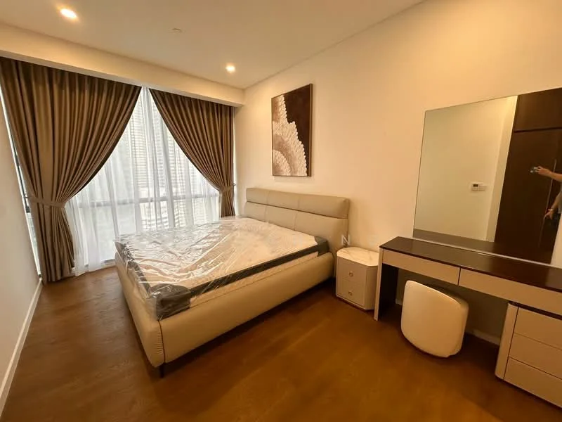 Bedroom features: king-size bed with upholstered headboard, white bedding, floor-to-ceiling windows, sheer curtains, dark brown wooden flooring, framed artwork on wall, built-in wardrobe, dressing table with mirror, white bedside table, white stool; style: modern; view: city.