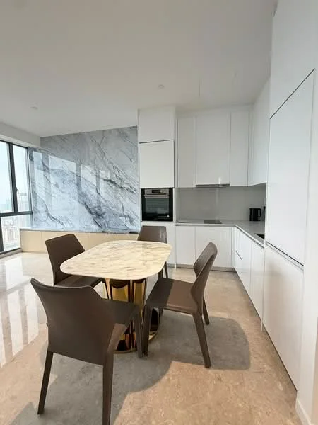 Kitchen features: white cabinetry, marble countertop, built-in oven, stainless-steel fridge, grey backsplash, 4-seater round dining table, 4 brown dining chairs, polished marble flooring, floor-to-ceiling windows, city view, recessed downlights; style: modern; view: city.
