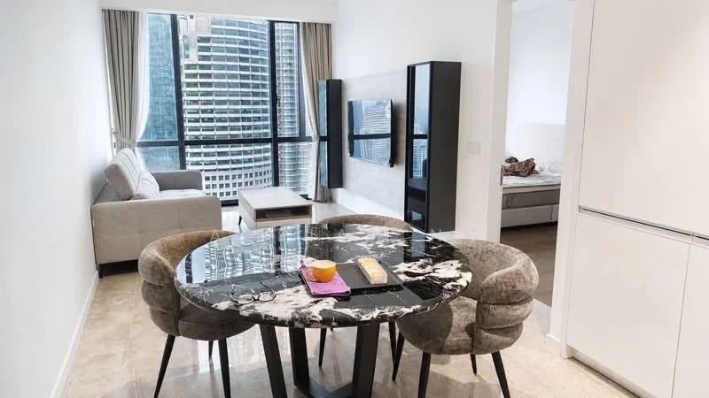 Dining features: round dining table with marble top, 4 upholstered dining chairs, decorative bowl on table, light-colored walls, marble flooring, floor-to-ceiling windows, city view, recessed lighting, open layout to living area; style: modern; view: city. Living features: 3-seater fabric sofa in light grey, coffee table, wall-mounted TV, light-colored walls, floor-to-ceiling windows, marble flooring, curtains, decorative items on TV console; style: modern; view: city. Bedroom features: queen-size bed, light-colored bedding, built-in wardrobe, light-colored walls, carpeted flooring, curtains; style: modern.