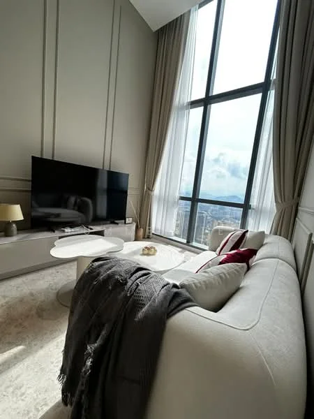 Living features: floor-to-ceiling windows, grey fabric sofa, white coffee table, wall-mounted TV, light grey walls, cream area rug, decorative throw pillows, curtains, side table with lamp; style: modern; view: city.