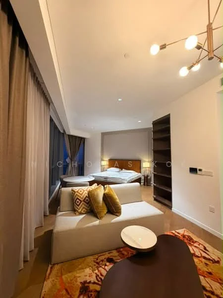 Living features: sofa with light grey upholstery, decorative cushions in yellow and patterned designs, coffee table with a round white top, area rug with a geometric pattern, floor-to-ceiling windows with sheer curtains, recessed downlights, wooden shelving unit, wall-mounted control panel, neutral wall colour, polished concrete flooring; style: modern. Bedroom features: king-size bed with light bedding, nightstands on either side of the bed, reading lamps on nightstands, built-in wardrobe, neutral wall colour, recessed downlights; style: modern.