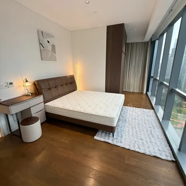 Bedroom features: queen-size bed, upholstered headboard, wooden flooring, floor-to-ceiling windows, city view, nightstand, table lamp, area rug with fluffy texture, built-in wardrobe, decorative wall art; style: modern; view: city.