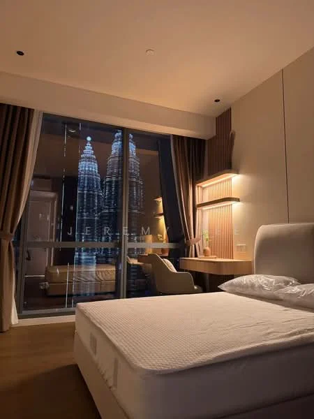 Bedroom features: king-size bed, upholstered headboard, wooden flooring, floor-to-ceiling windows, sheer curtains, desk with chair, wall-mounted light fixtures, decorative wall paneling; style: modern; view: city.