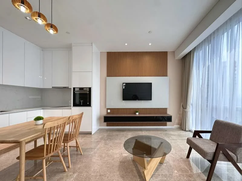 Living features: light wood dining table with four chairs, brown upholstered armchair, glass coffee table, wall-mounted TV, white cabinetry, built-in oven, stainless-steel fridge, marble flooring, large floor-to-ceiling windows with sheer curtains, wood accent wall, three pendant lights; style: modern.