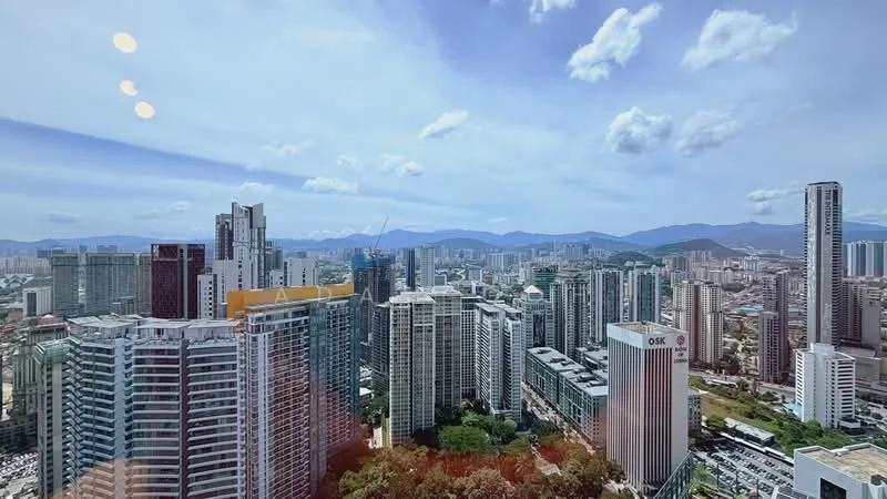 Exterior type: high-rise condominium; features: city skyline view, surrounded by high-rise buildings, mountain backdrop, clear blue sky, green landscaping in foreground; style: modern.