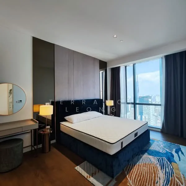 Bedroom features: king-size bed, upholstered headboard, bedside lamps, round mirror, wooden bedside table, desk with chair, green upholstered stool, area rug with geometric pattern, floor-to-ceiling windows, curtains, city view, wooden flooring; style: modern; view: city.