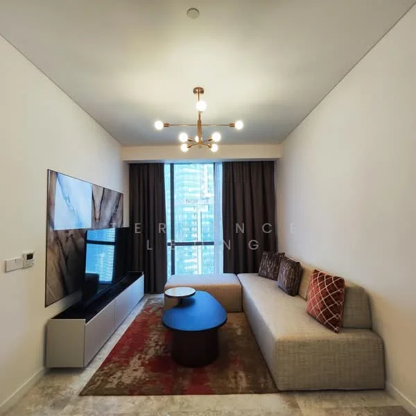 Living features: sofa with light fabric upholstery, decorative throw pillows in red and orange, coffee table with round shape, wall-mounted TV, TV console in white finish, large window with city view, floor-to-ceiling curtains in dark brown, chandelier with multiple bulbs, area rug with geometric pattern, light-colored walls, marble flooring; style: modern; view: city.
