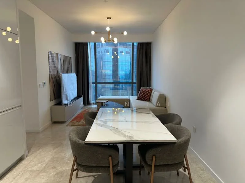Living features: marble dining table, 4 upholstered dining chairs, 3-seater fabric sofa in light color, wall-mounted TV, TV console, area rug with geometric pattern, large windows with city view, chandelier with multiple bulbs, neutral painted walls, stone flooring, curtains, decorative wall art; style: modern; view: city.
