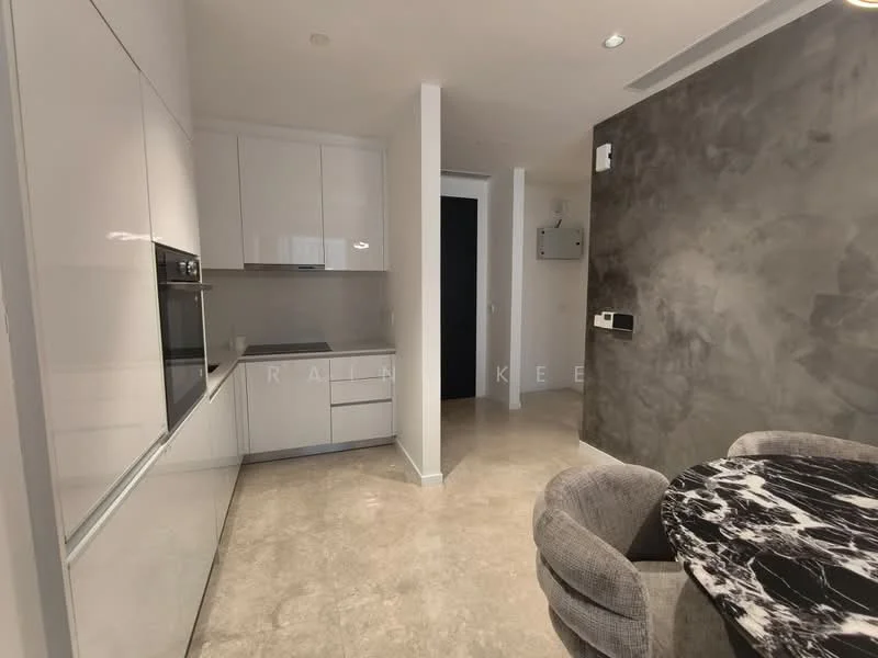 Kitchen features: white glossy cabinetry, built-in oven, stainless-steel fridge, grey stone countertop, marble dining table, upholstered dining chairs, grey concrete accent wall, recessed downlights, ceramic tile flooring; style: modern.