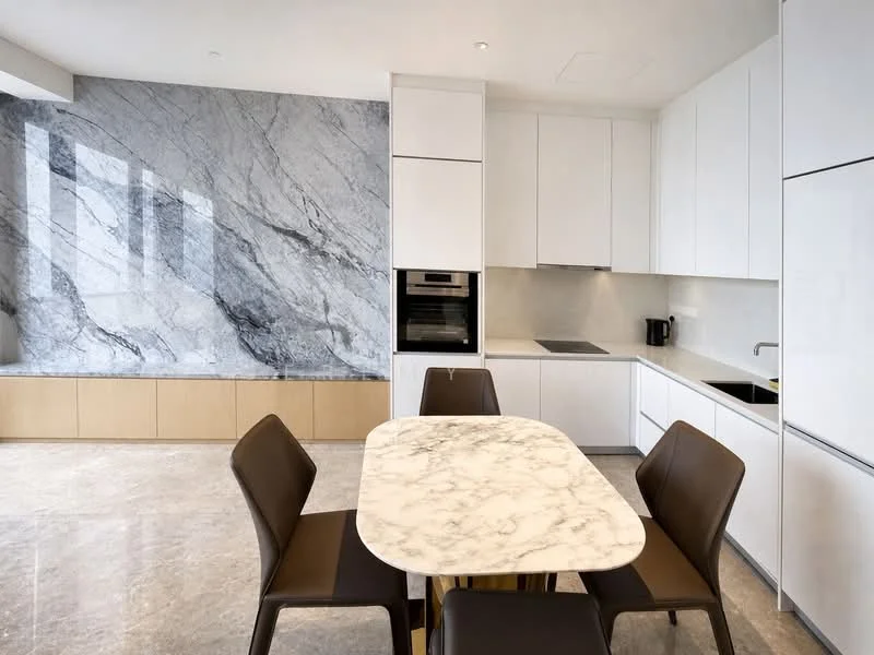 Kitchen features: white cabinetry, marble countertop, built-in oven, stainless-steel fridge, single-bowl stainless-steel sink, chrome pull-down faucet, grey marble feature wall, ceramic tile flooring, recessed downlights, four dining chairs, dining table with marble top, black kitchen appliances; style: modern.