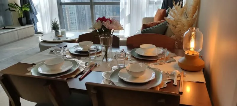 Dining features: wooden dining table, 4 dining chairs, white ceramic plates, glass drinking glasses, chopsticks, decorative table runner, vase with flowers, table lamp with warm light, light-colored placemats; style: modern; view: city. Living features: sofa with cushions, decorative throw pillows, coffee table, floor-to-ceiling windows, curtains, potted plant; style: modern; view: city.