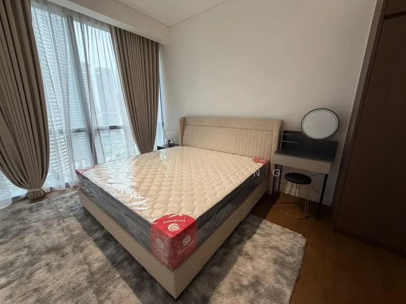 Bedroom features: queen-size bed with upholstered headboard, mattress with protective cover, nightstand with lamp, round mirror on desk, desk with chair, floor-to-ceiling windows with sheer curtains, beige carpet, wooden flooring, built-in wardrobe; style: modern; view: city.
