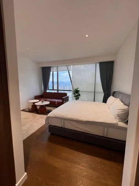 Bedroom features: king-size bed with grey upholstered headboard, white bedding, wooden flooring, floor-to-ceiling windows, sheer curtains, dark blue curtains, decorative plant in ceramic pot, 2-seater leather sofa in brown, 2 round coffee tables, area rug with neutral tones; style: modern; view: city.