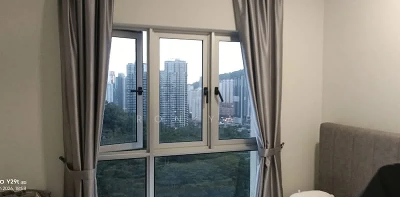Room features: floor-to-ceiling windows, grey curtains, city skyline view, light-colored walls, upholstered headboard, bedside table, decorative items on bedside table; style: modern; view: city.
