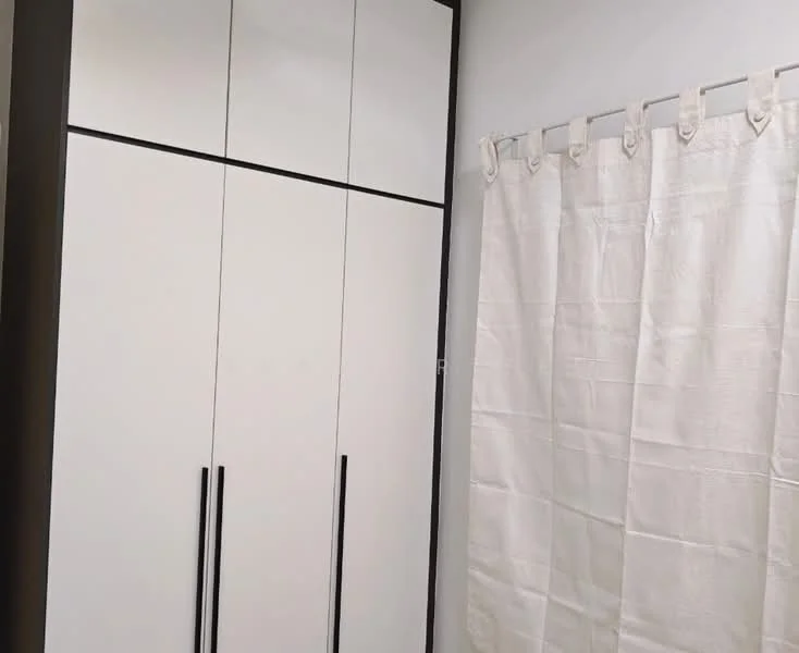 Room features: white cabinetry with black handles, floor-to-ceiling wardrobe, curtain with tiebacks, light grey wall, neutral flooring; style: modern.
