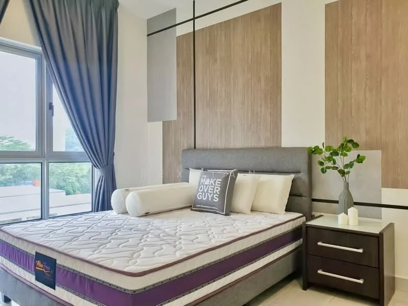 Bedroom features: queen-size bed with grey upholstered headboard, white bedding with decorative pillows, nightstand with two drawers, decorative plant on nightstand, large window with sheer curtains, wood accent wall, light-colored flooring, wall-mounted artwork, candle decor on nightstand; style: modern; view: garden.