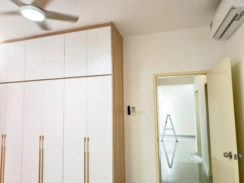 Room features: built-in wardrobe with white doors, wooden cabinetry, light-colored walls, ceiling fan, wall-mounted split AC, glossy tile flooring, doorway leading to another room, step ladder in background; style: modern.
