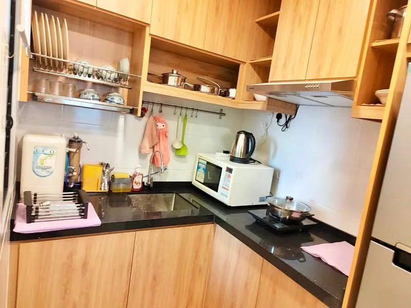 Kitchen features: wood cabinetry, black granite countertop, stainless-steel sink, chrome pull-down faucet, built-in microwave, electric kettle, freestanding gas stove, dish rack, wall-mounted shelf, white tiled backsplash, pink kitchen mat; style: modern.