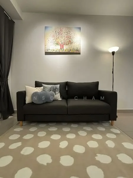 Living features: black fabric sofa, decorative throw pillows, area rug with polka dots, floor lamp, framed artwork on wall, grey walls, curtains, light-colored flooring; style: modern.